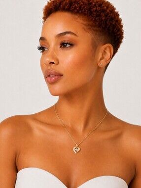 Nina Ricci Gold Tone Heart Pendant Necklace